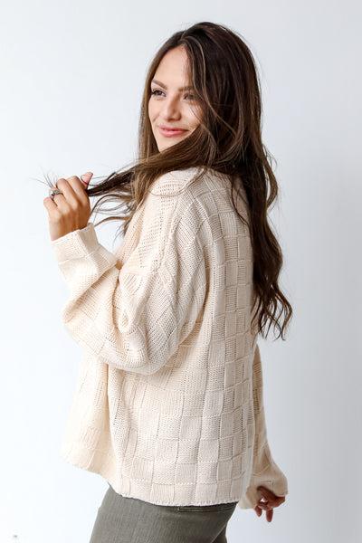ivory checkered sweater side view