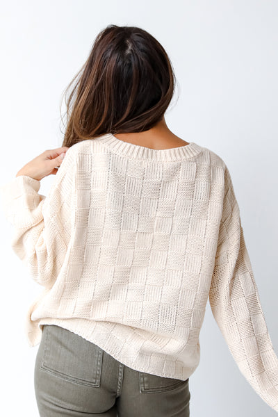 ivory checkered sweater back view