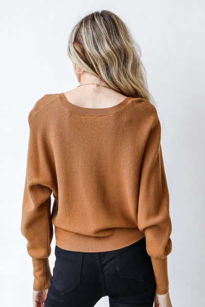 Sweater in camel back view