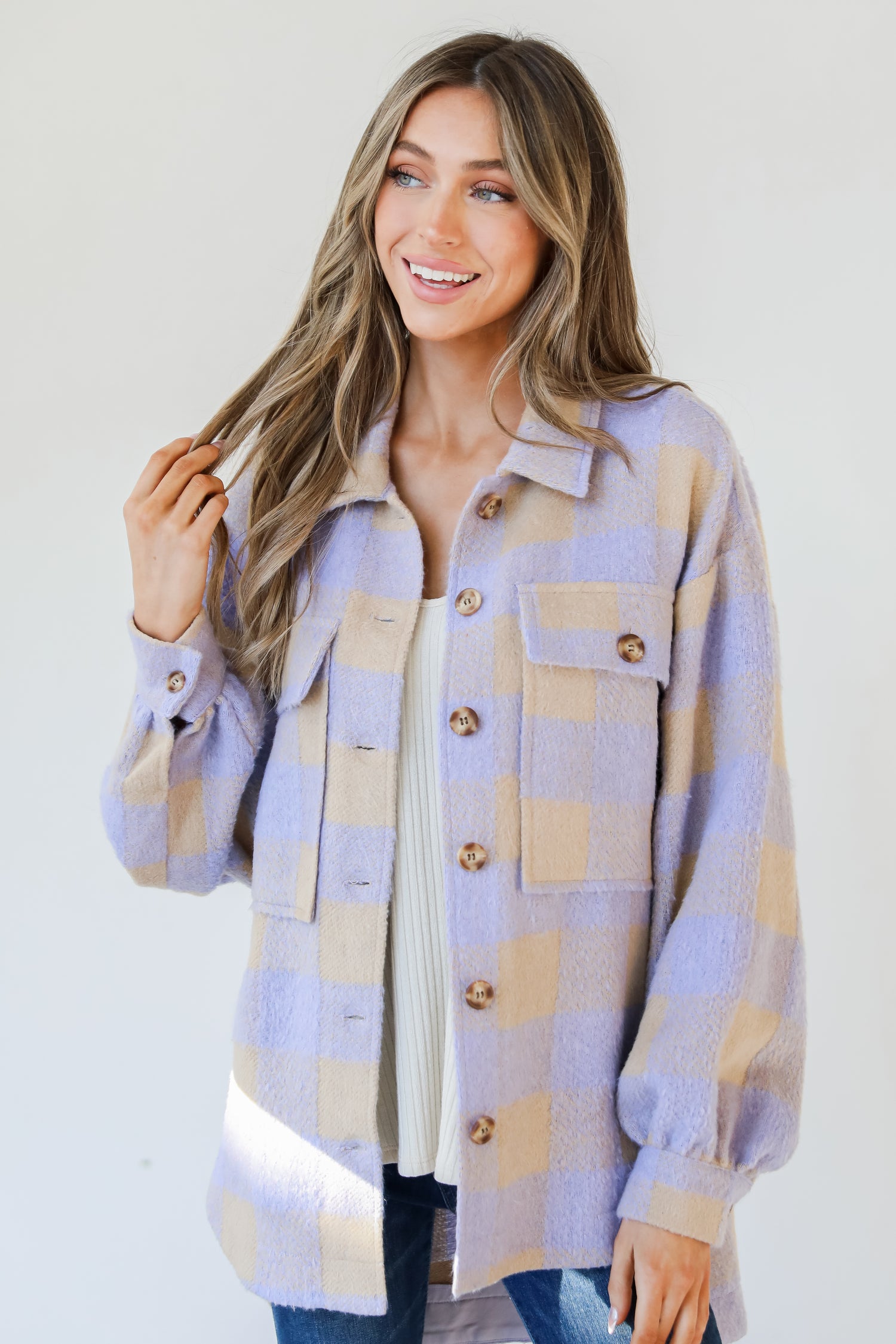 model wearing a purple Plaid Shacket