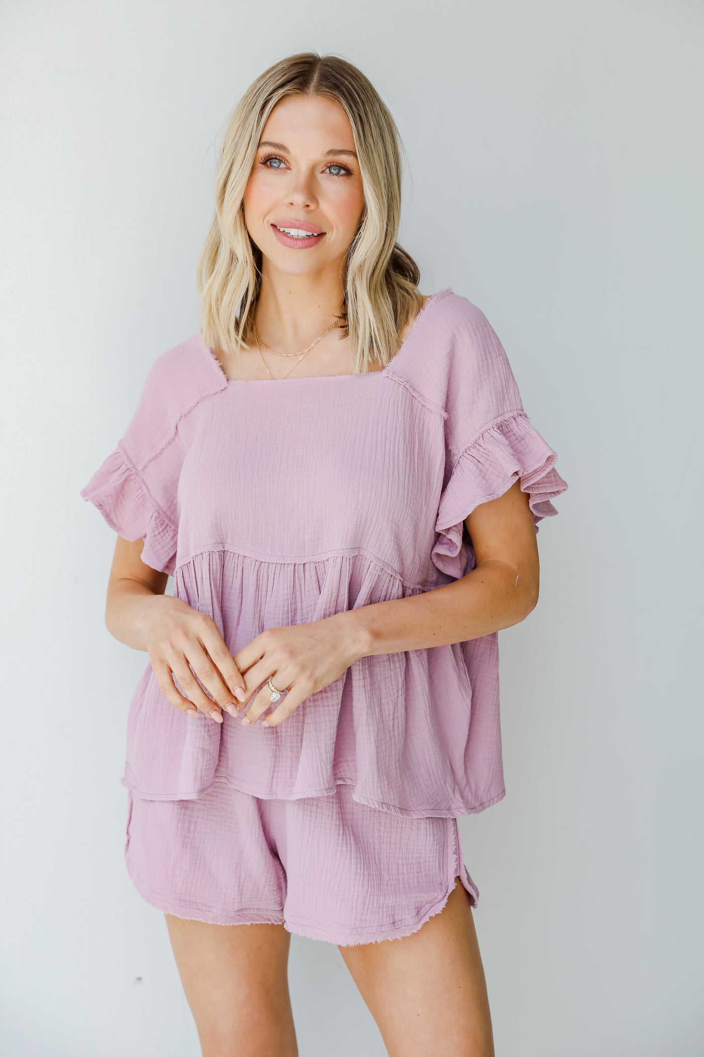 Linen Babydoll Top in lilac on model