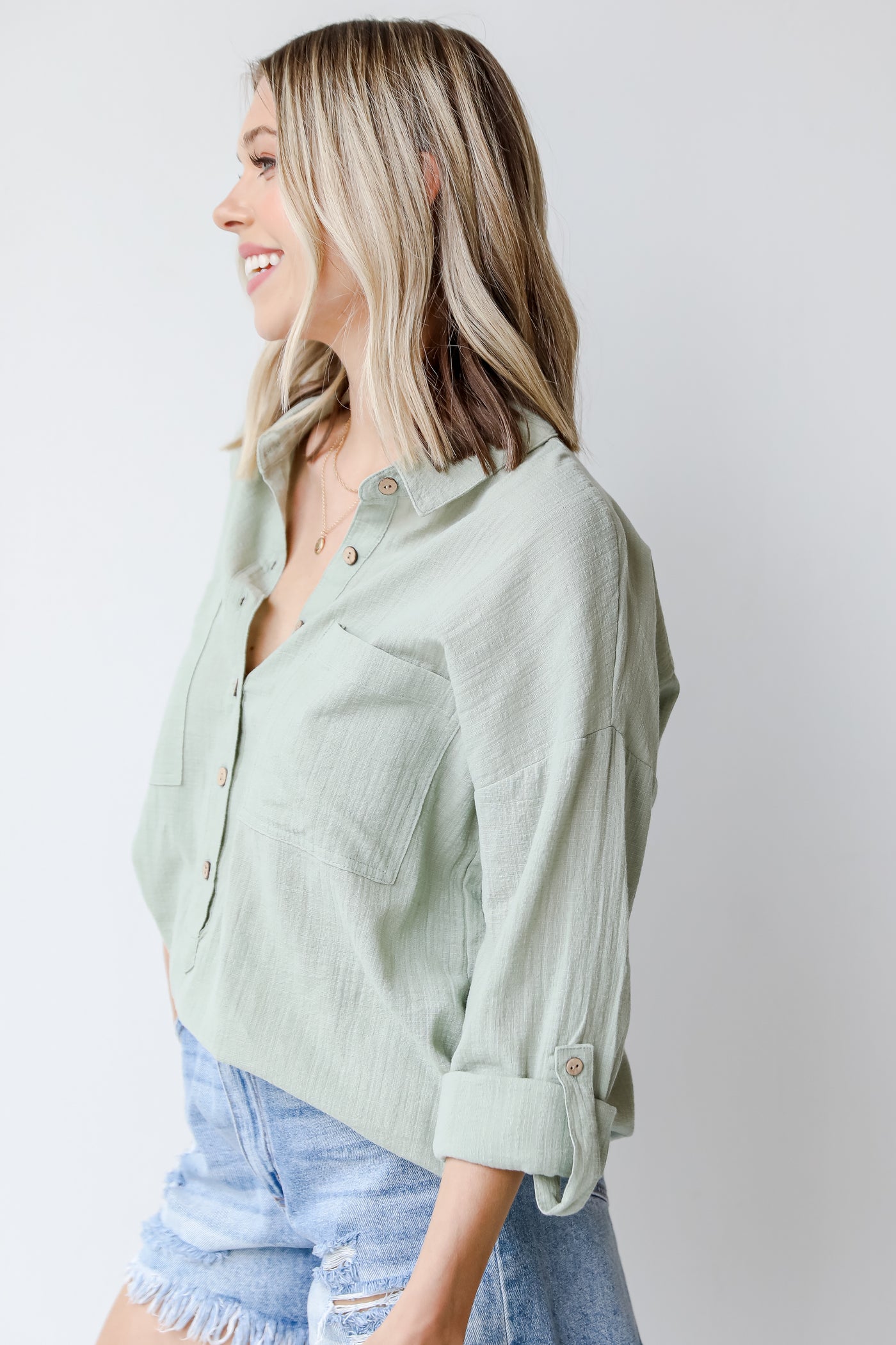 Linen Button-Up Blouse in sage side view