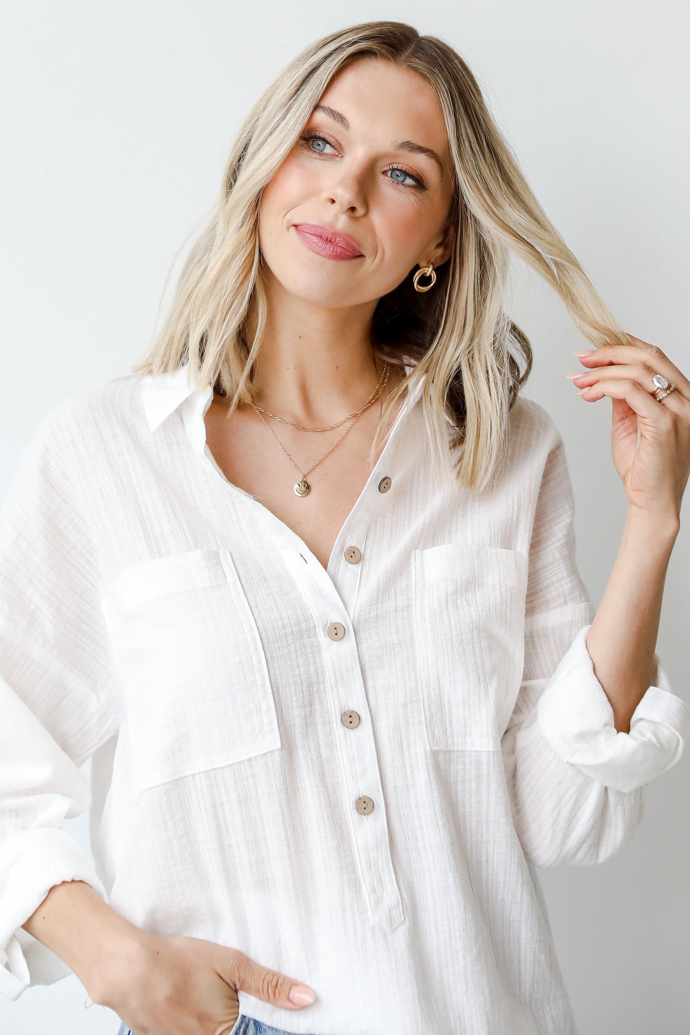 Linen Button-Up Blouse in white on model