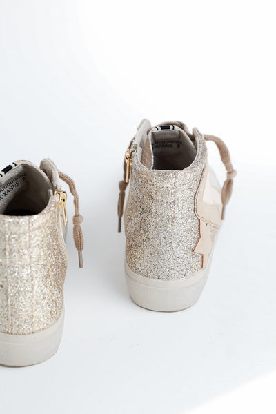back view of glitter high top sneakers