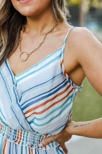 close up view of model wearing striped maxi dress
