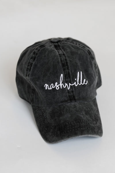 Nashville Script Embroidered Hat in black flat lay