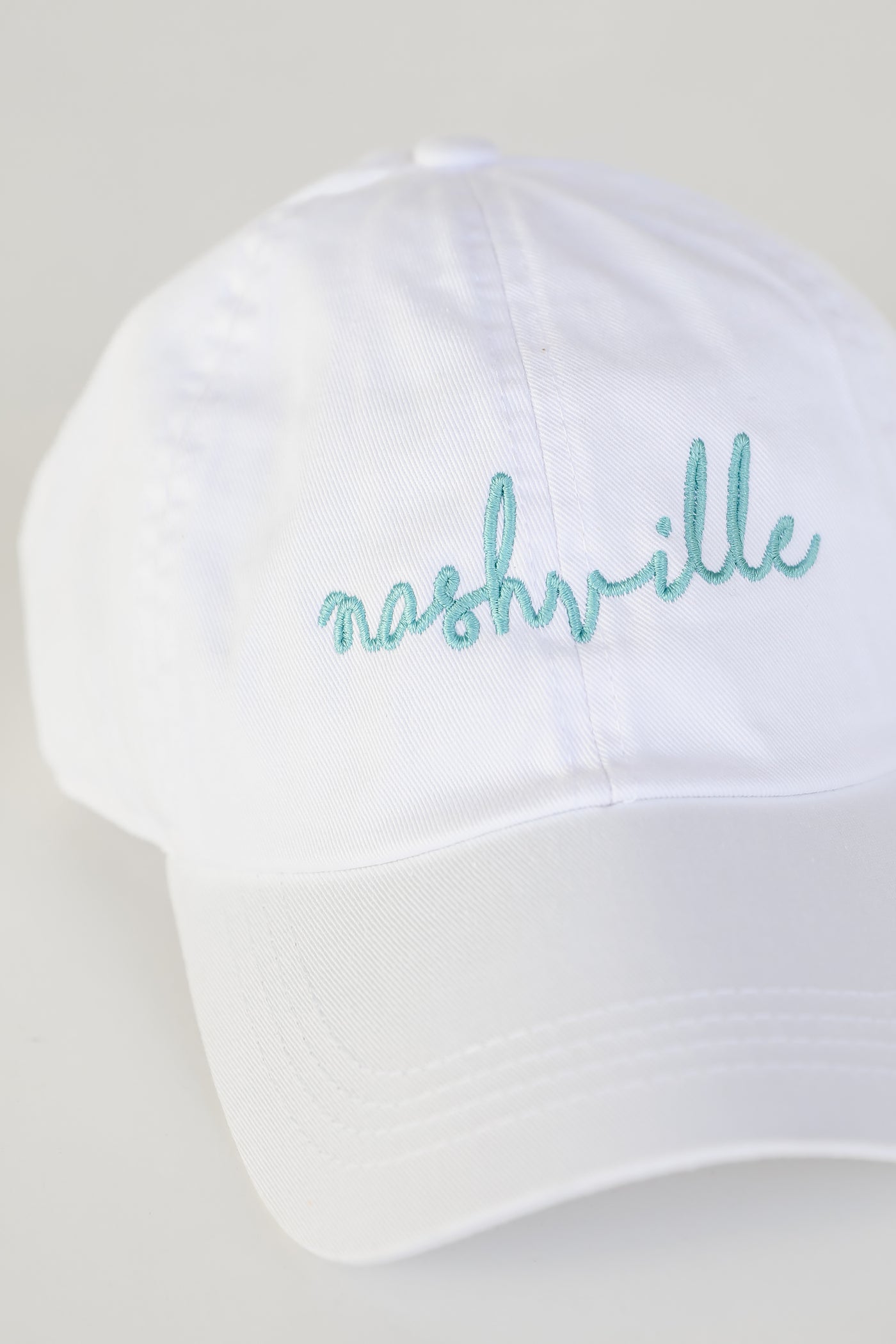 Nashville Script Embroidered Hat in seafoam flat lay