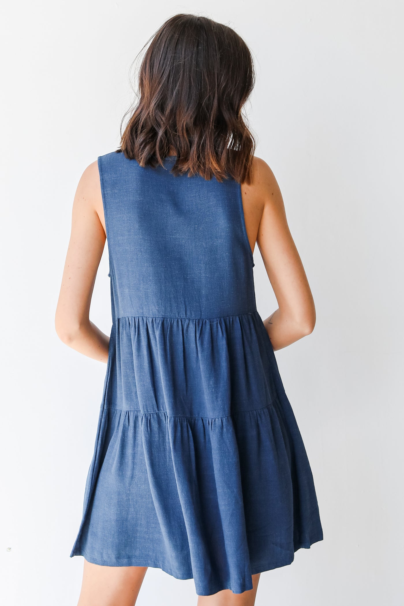 Linen Tiered Mini Dress in navy back view