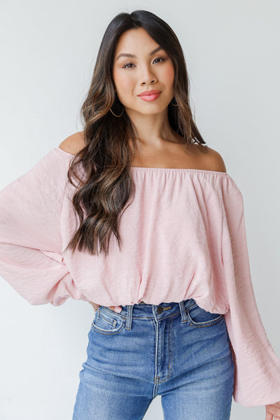 blush off the shoulder blouse front view