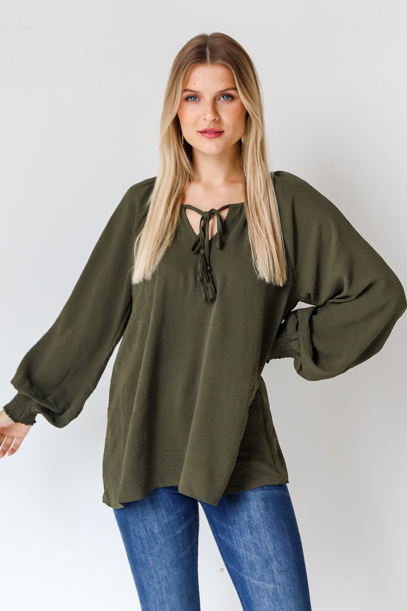 olive blouse on model
