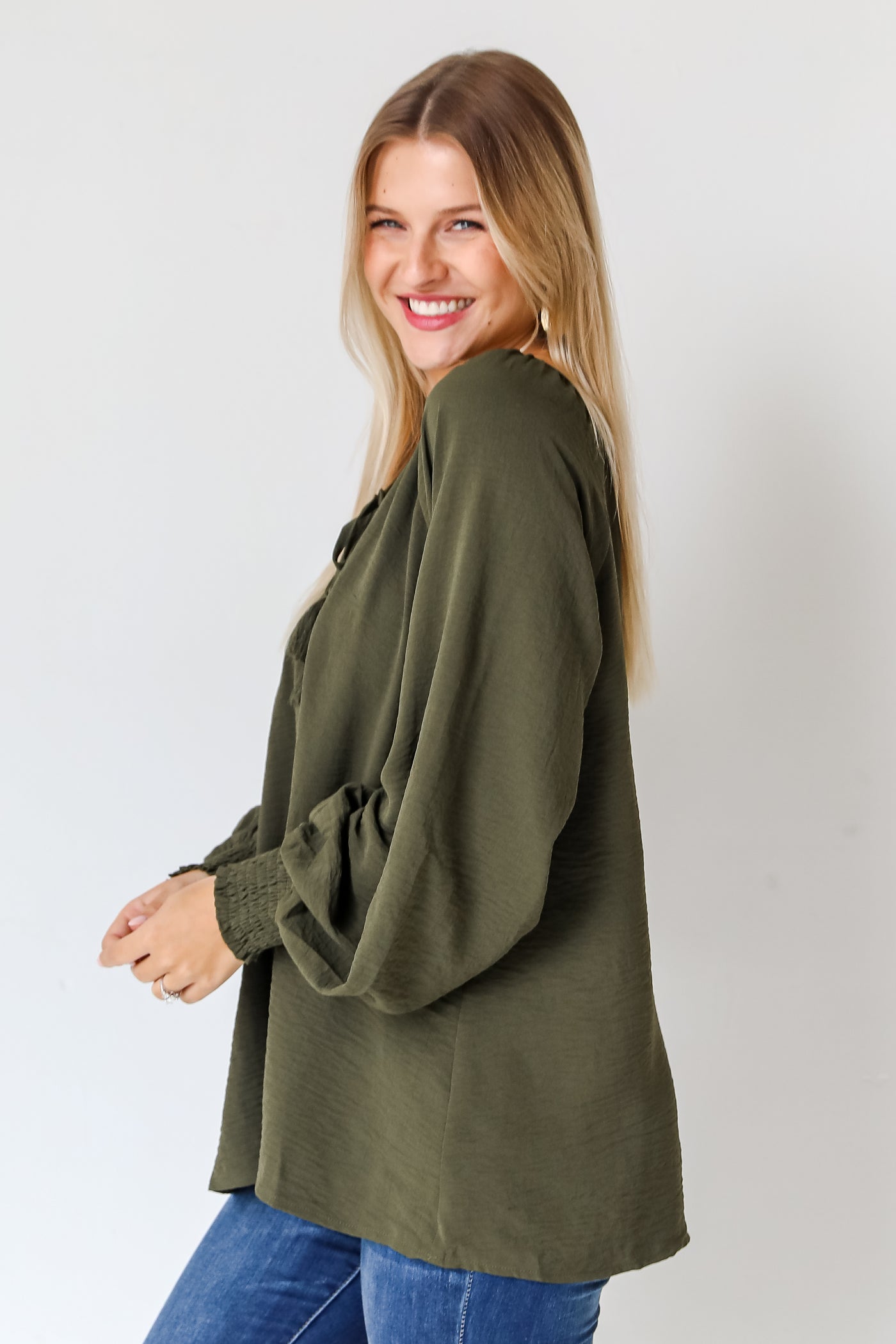 olive blouse side view