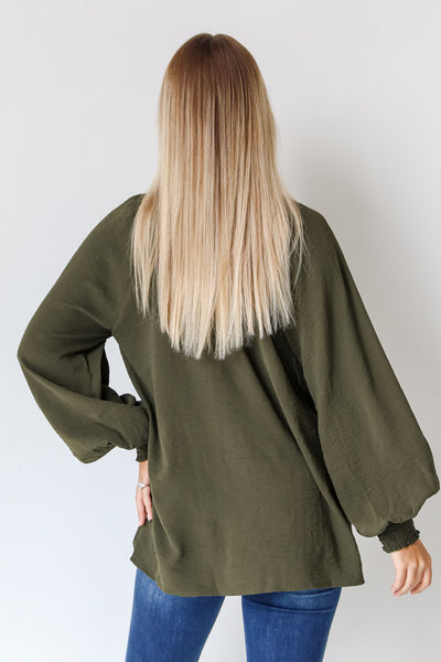 olive blouse back view