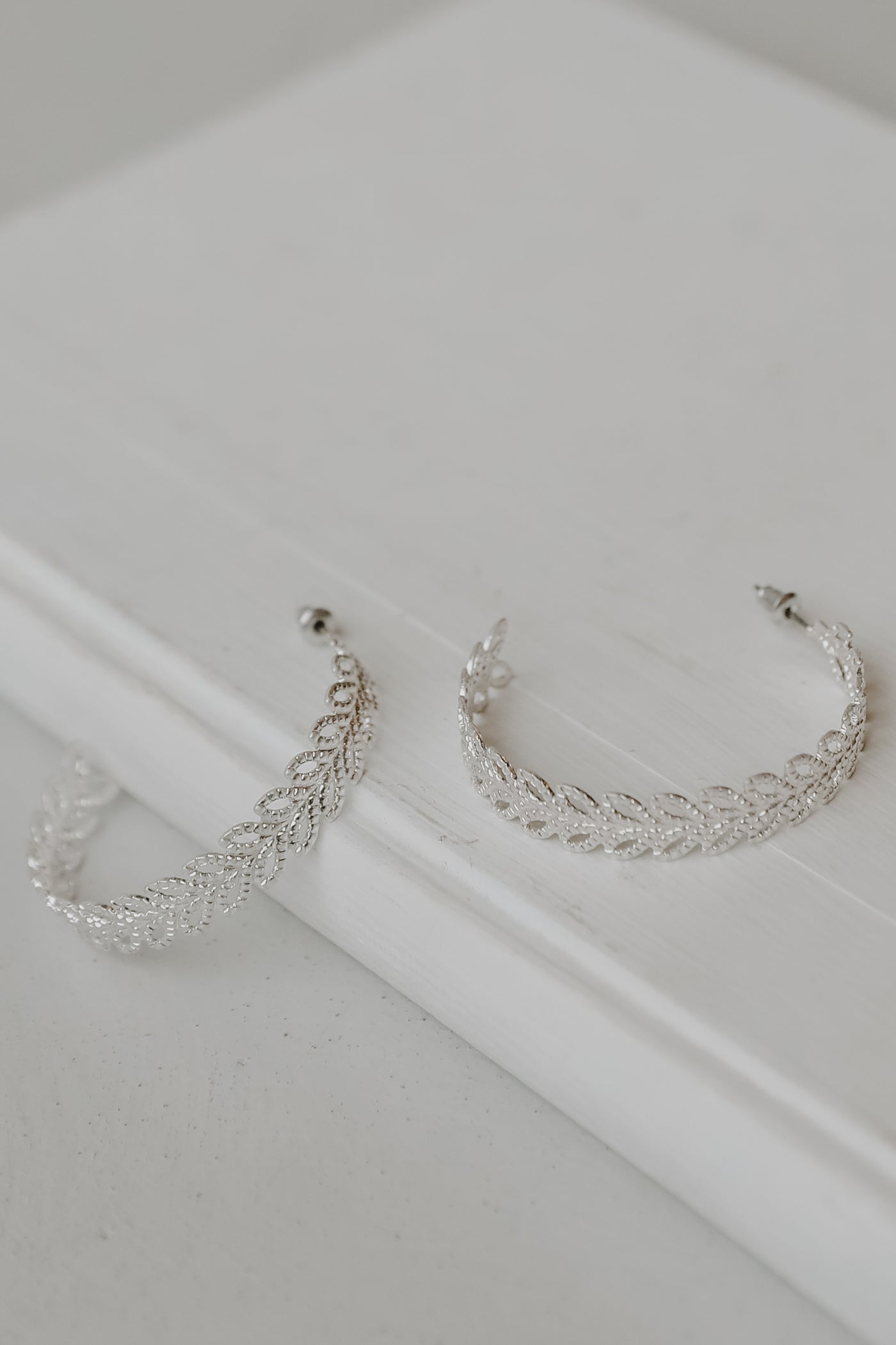 Hoop Earrings in silver flat lay