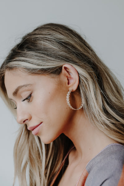 Hoop Earrings in gold on model