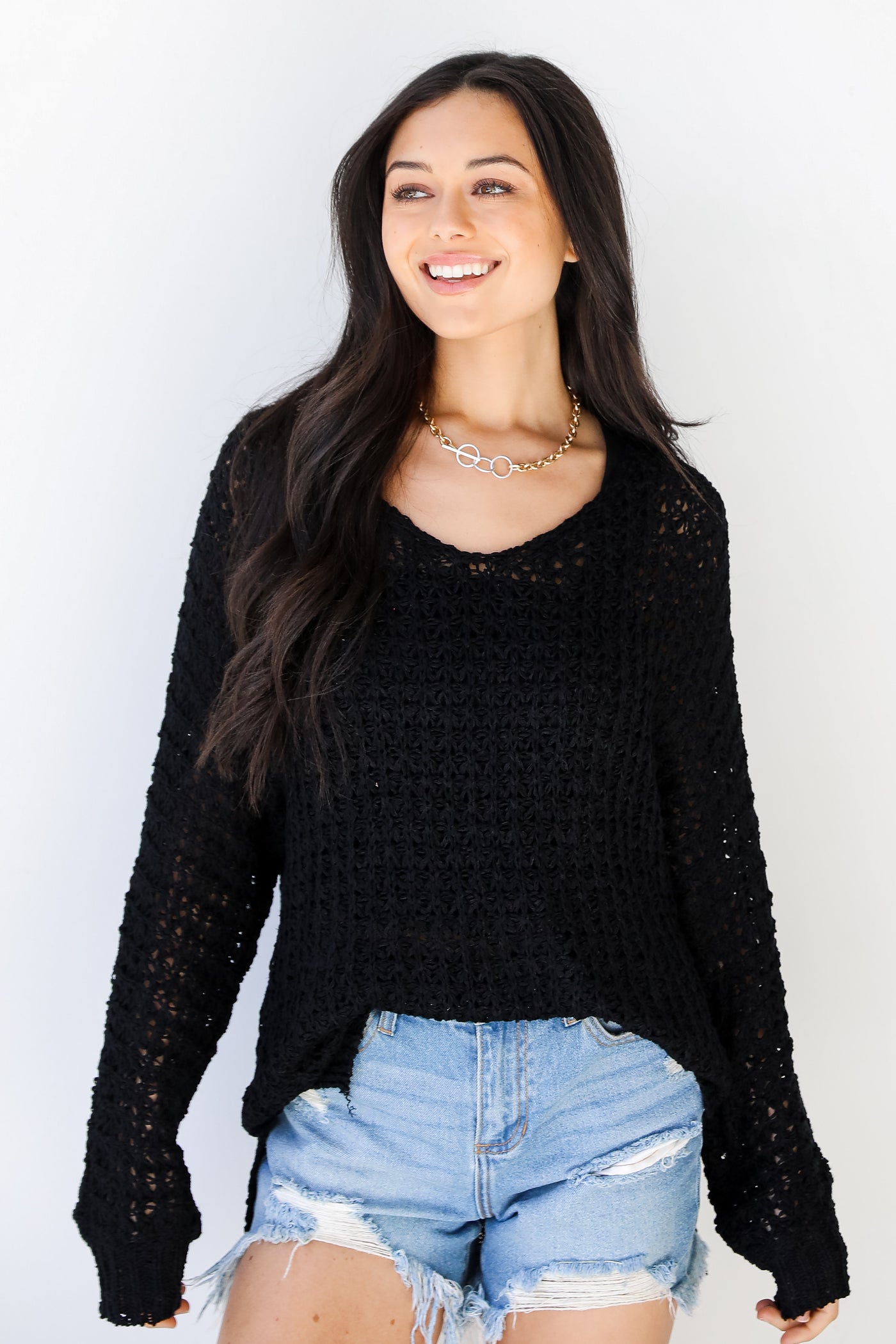 Loose Knit Sweater in black on model