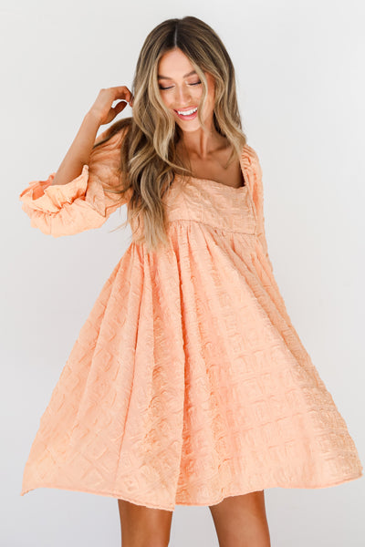 orange Babydoll Mini Dress on dress up model