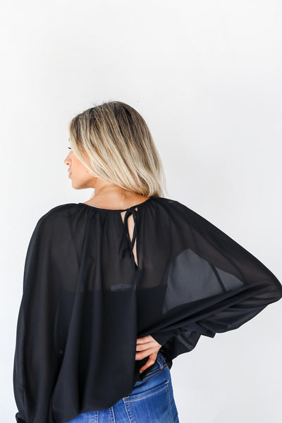 Blouse in black back view