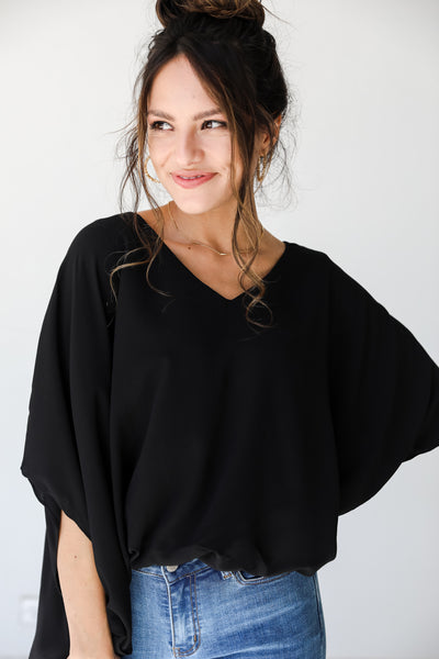 black oversized blouse