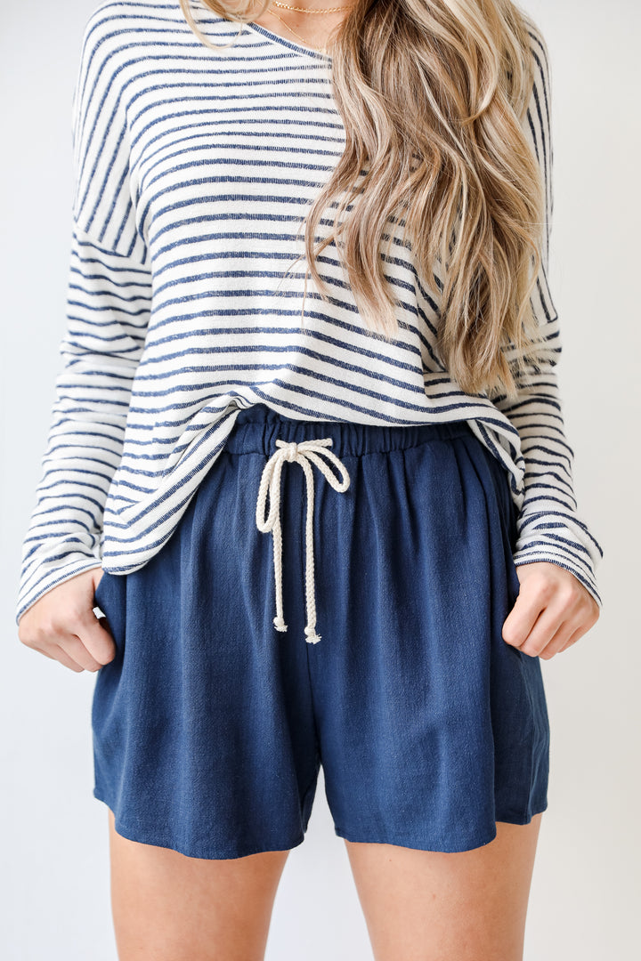 Linen Shorts in navy on model