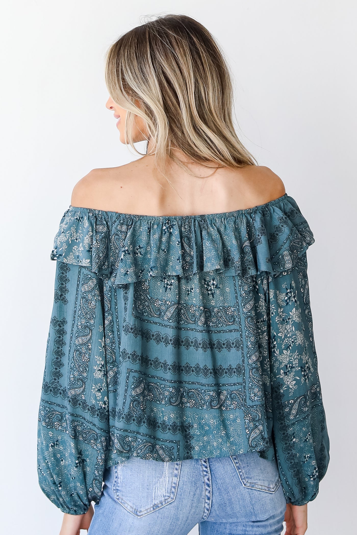 Floral Ruffle Blouse in teal back view