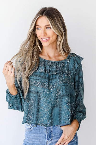 Floral Ruffle Blouse in teal front view