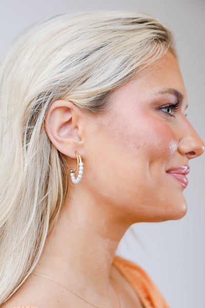 Gold Pearl Hoop Earrings on model