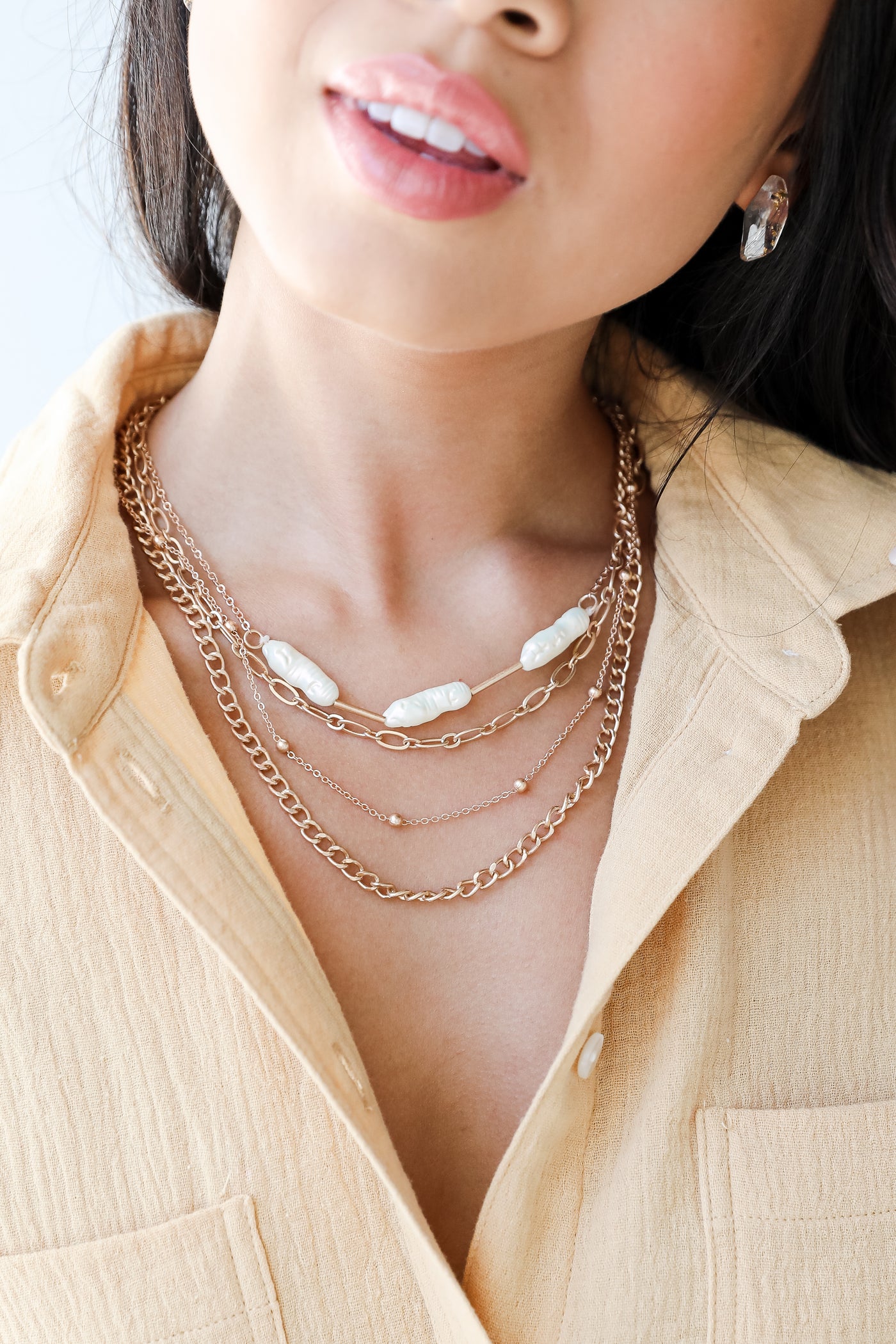 Gold Pearl Layered Necklace on model