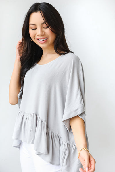 Peplum Blouse in grey side view