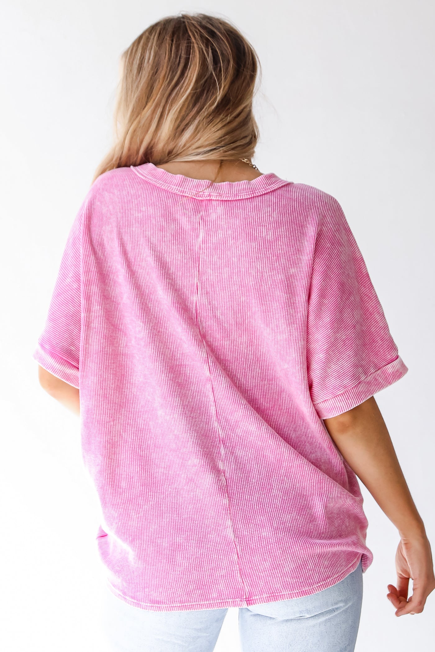 pink tee back view