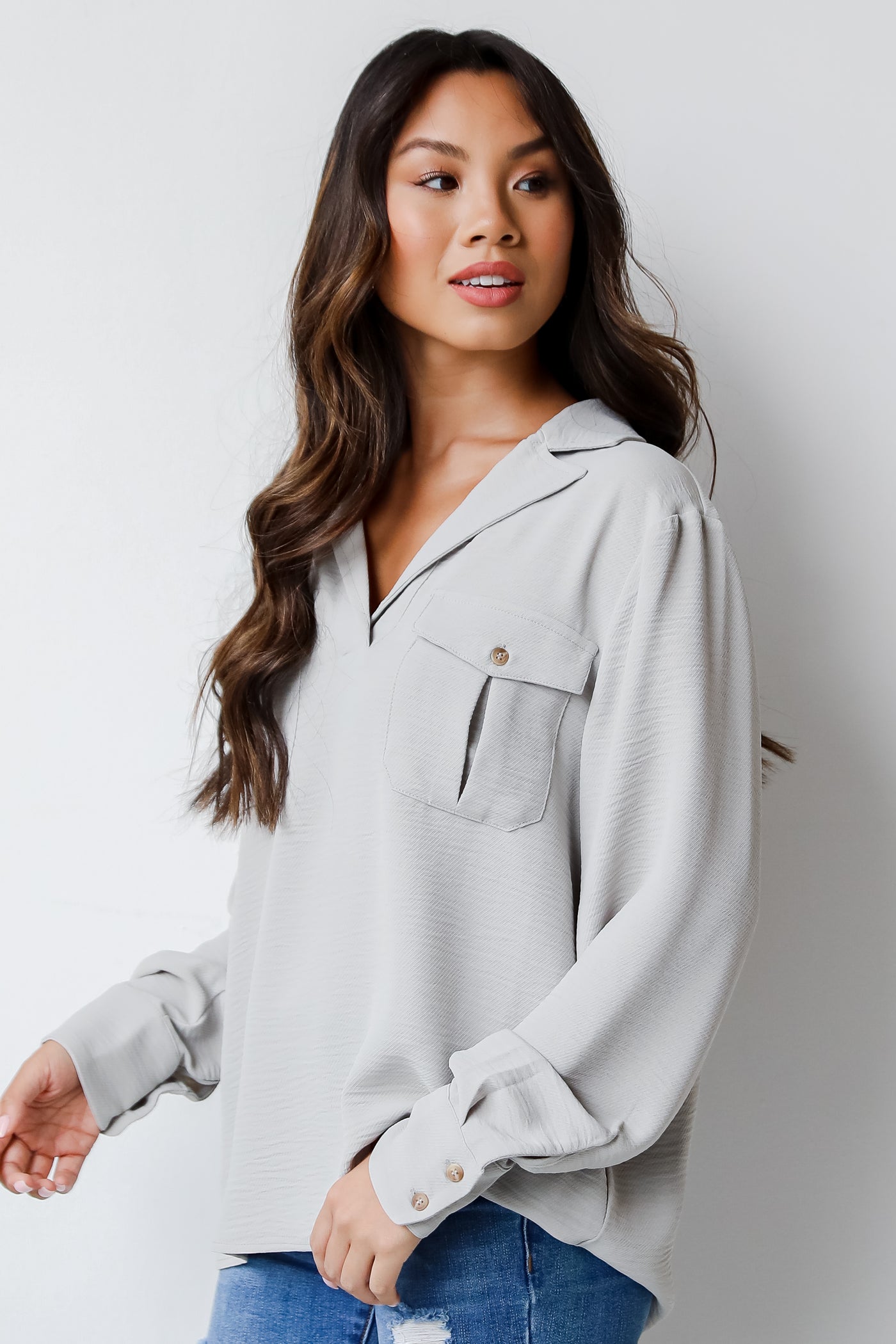 grey collared blouse side view