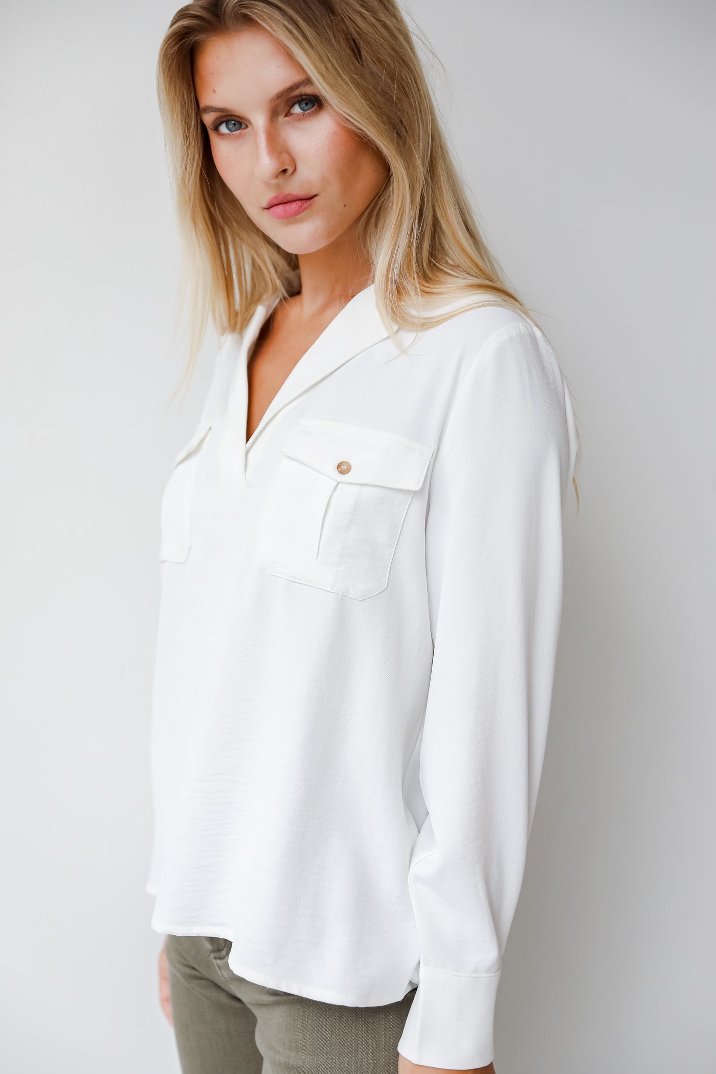 white collared blouse side view