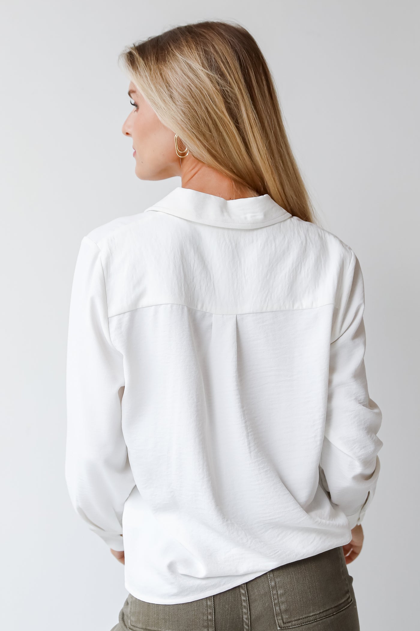 white collared blouse back view