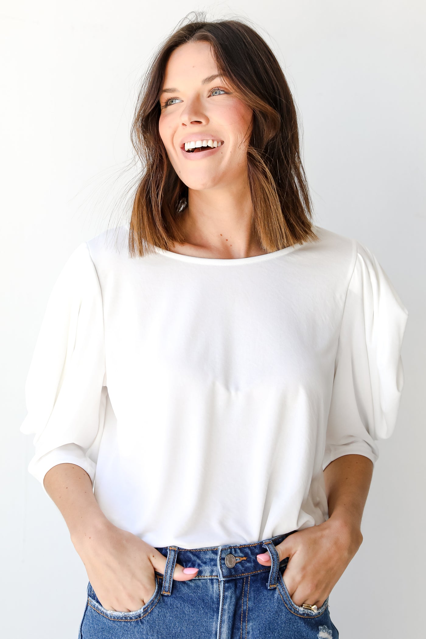 Puff Sleeve Top in white on model