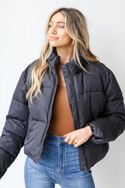 Puffer Jacket in black front view