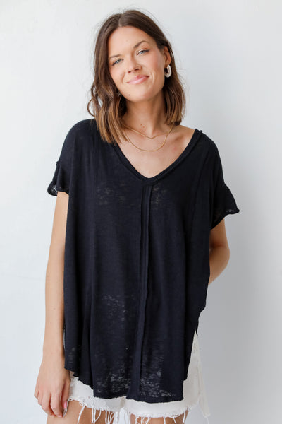 Knit Exposed Seam Tee in black on model