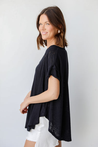 Knit Exposed Seam Tee in black side view