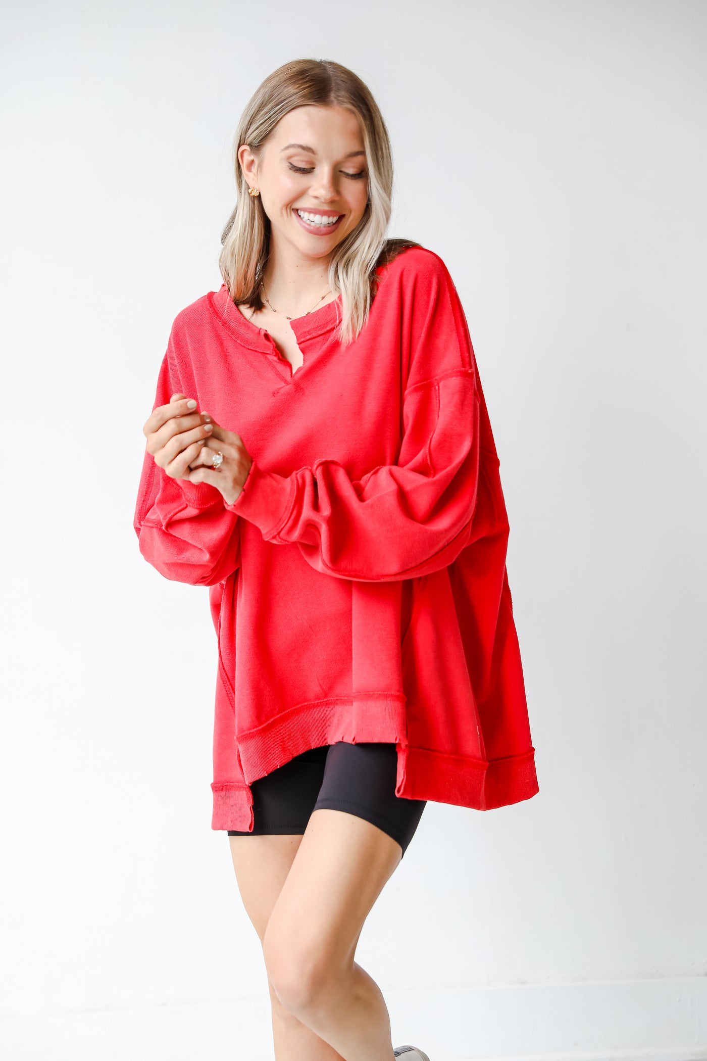red pullover on dress up model