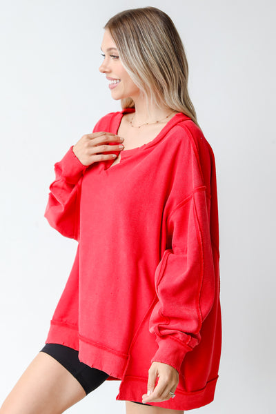 red pullover side view