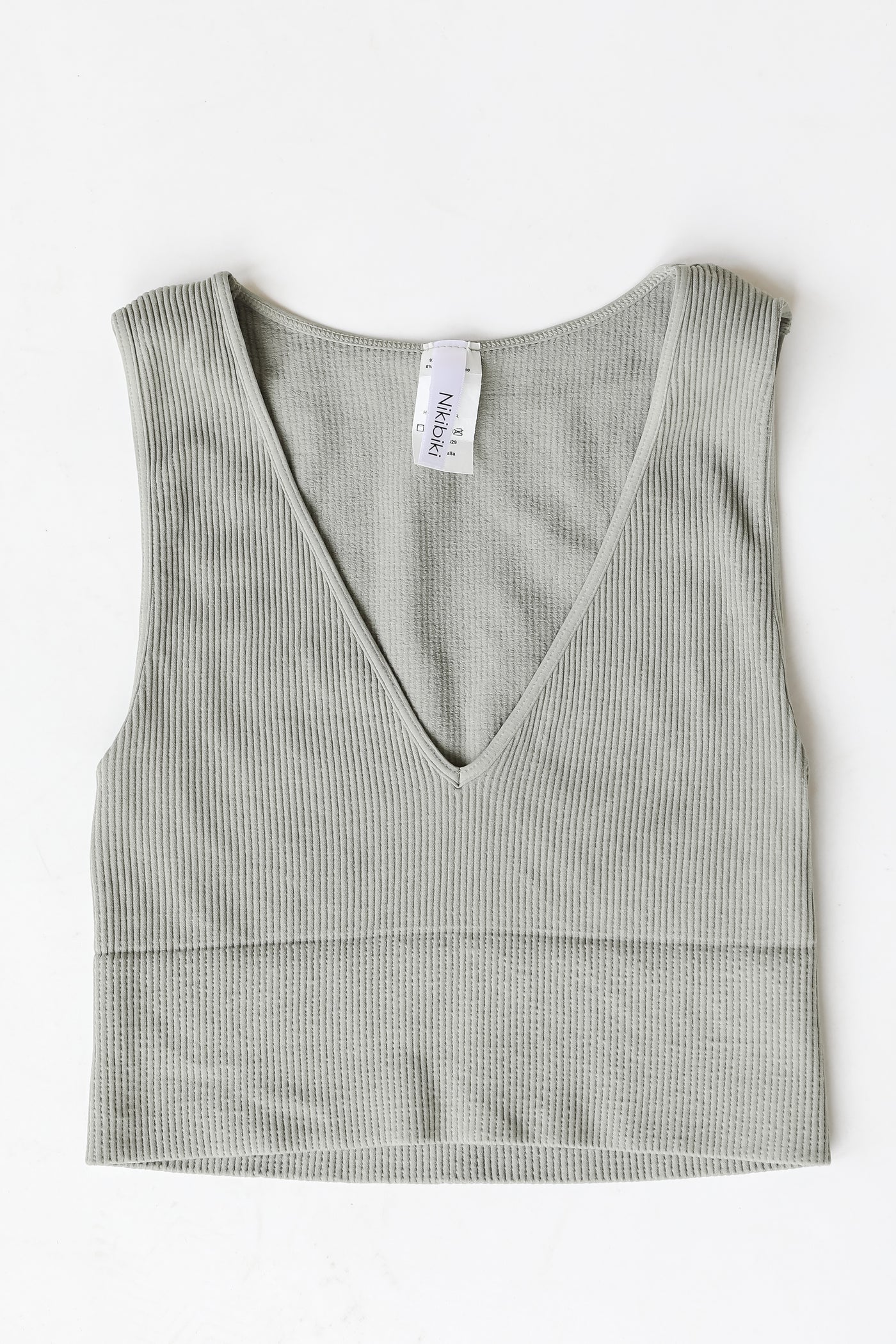 V-Neck Ribbed Cropped Tank in sage flat lay