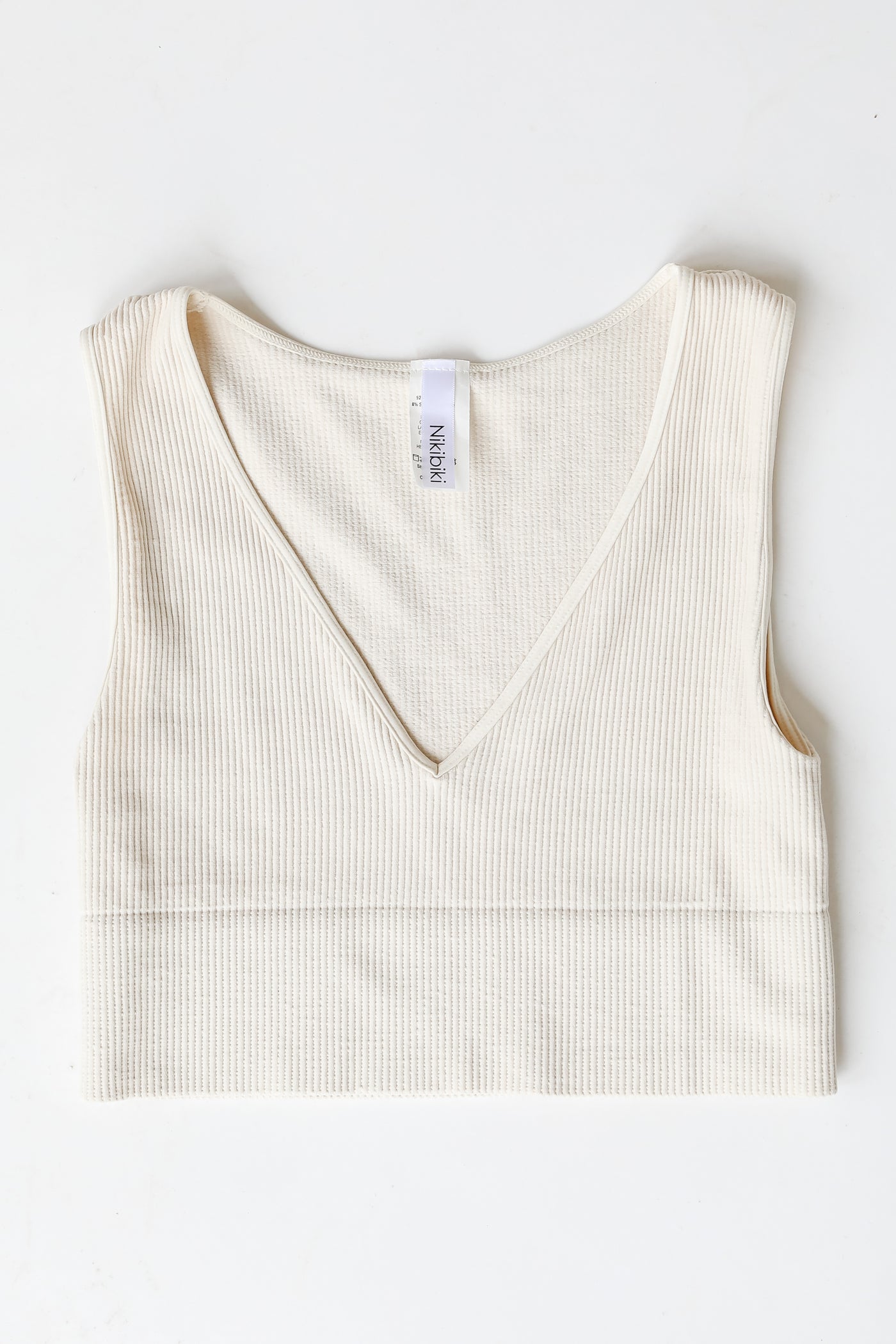 V-Neck Ribbed Cropped Tank in ivory flat lay