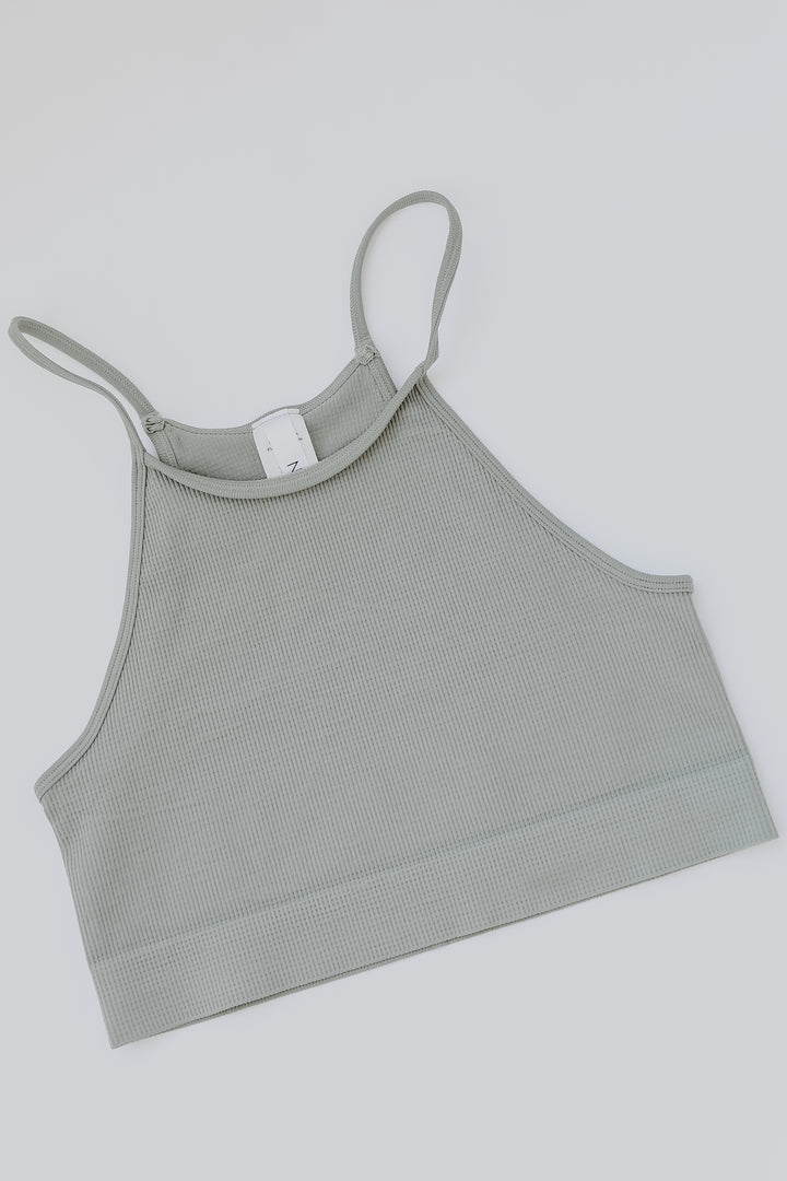 Seamless Cropped Ribbed Tank in sage flat lay