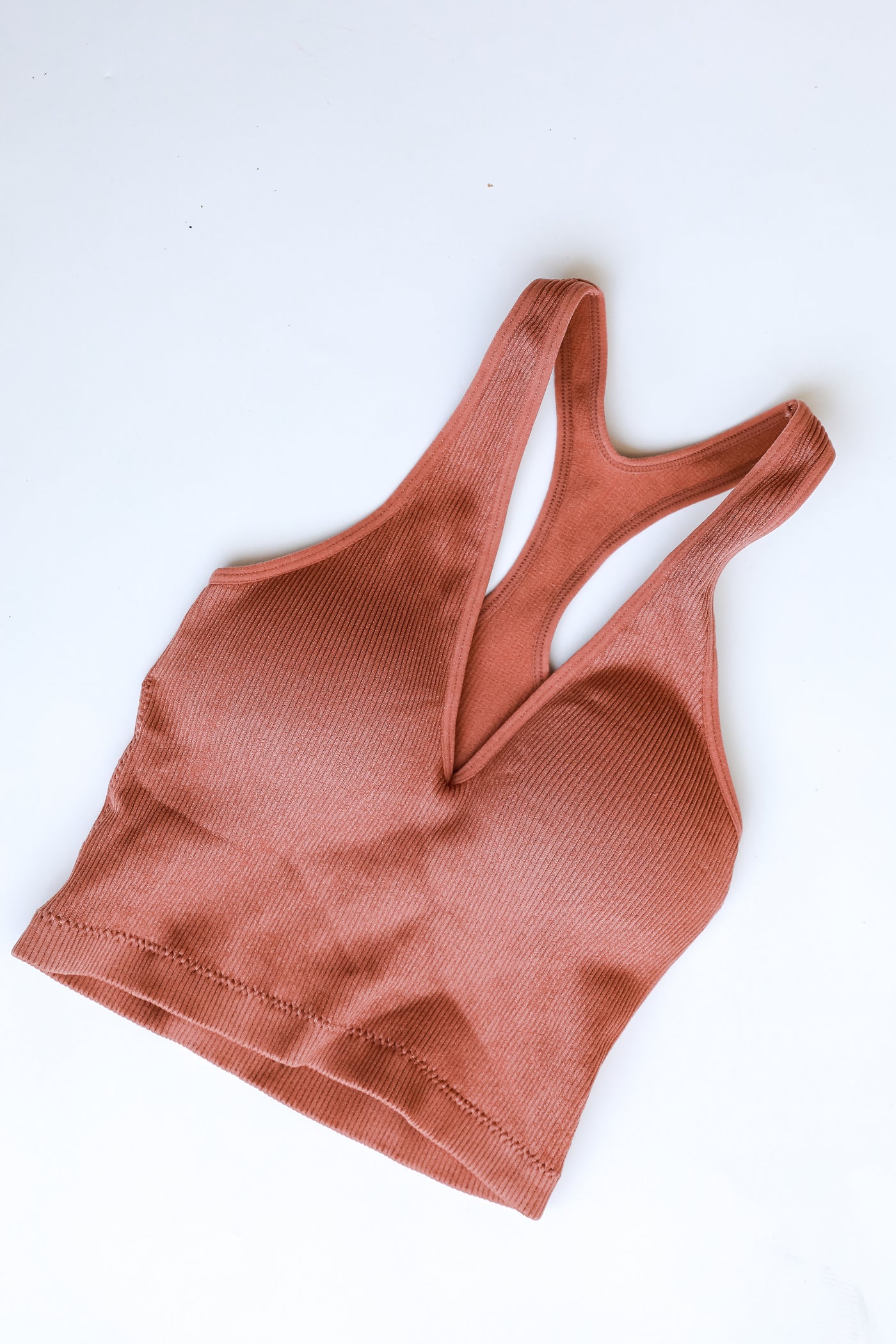 Padded V-Neck Ribbed Cropped Tank in terracotta flat lay