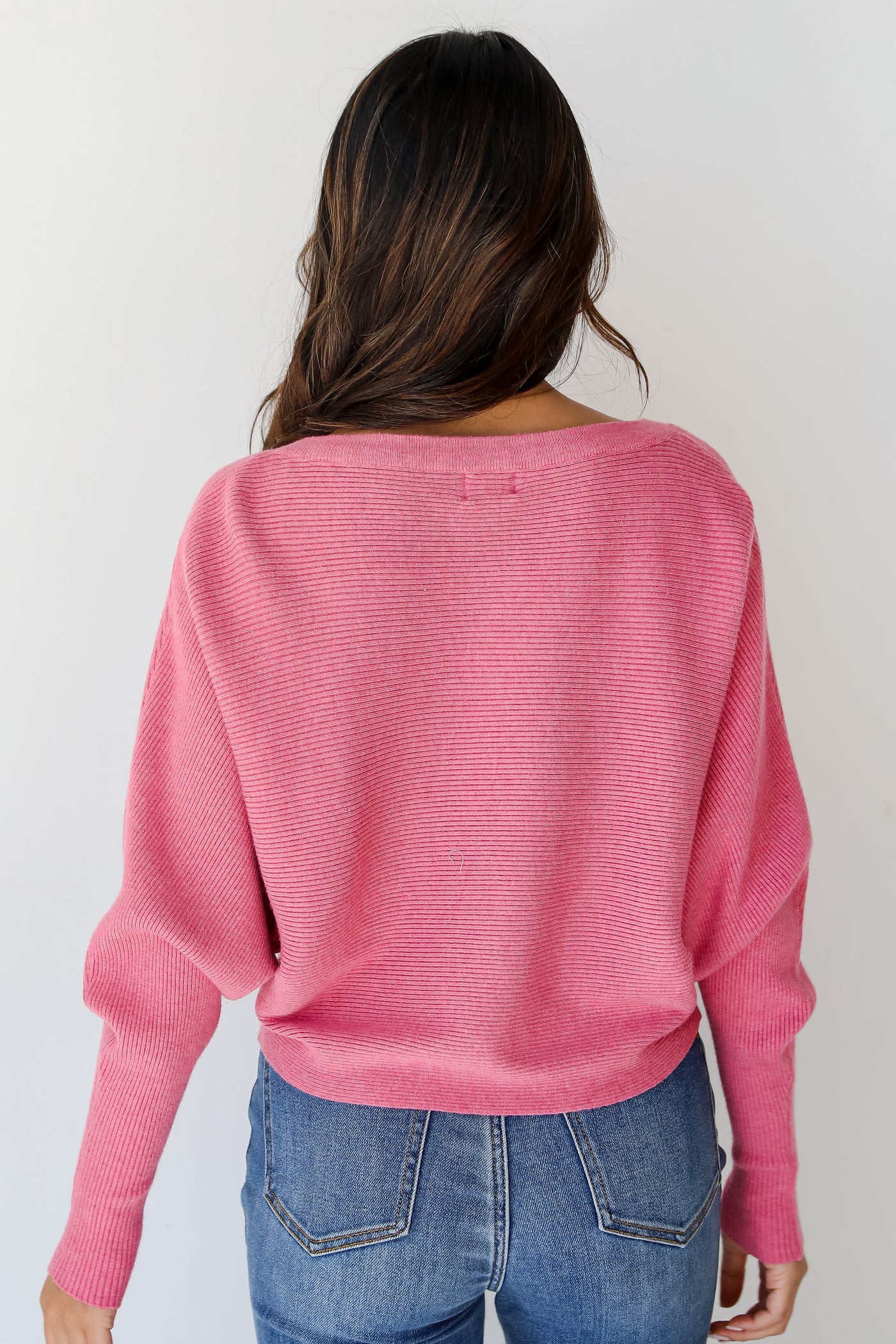 pink ribbed Sweater back view