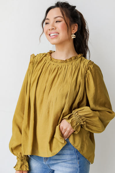 Blouse in mustard side view