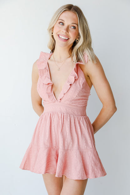 Romper in mauve on model