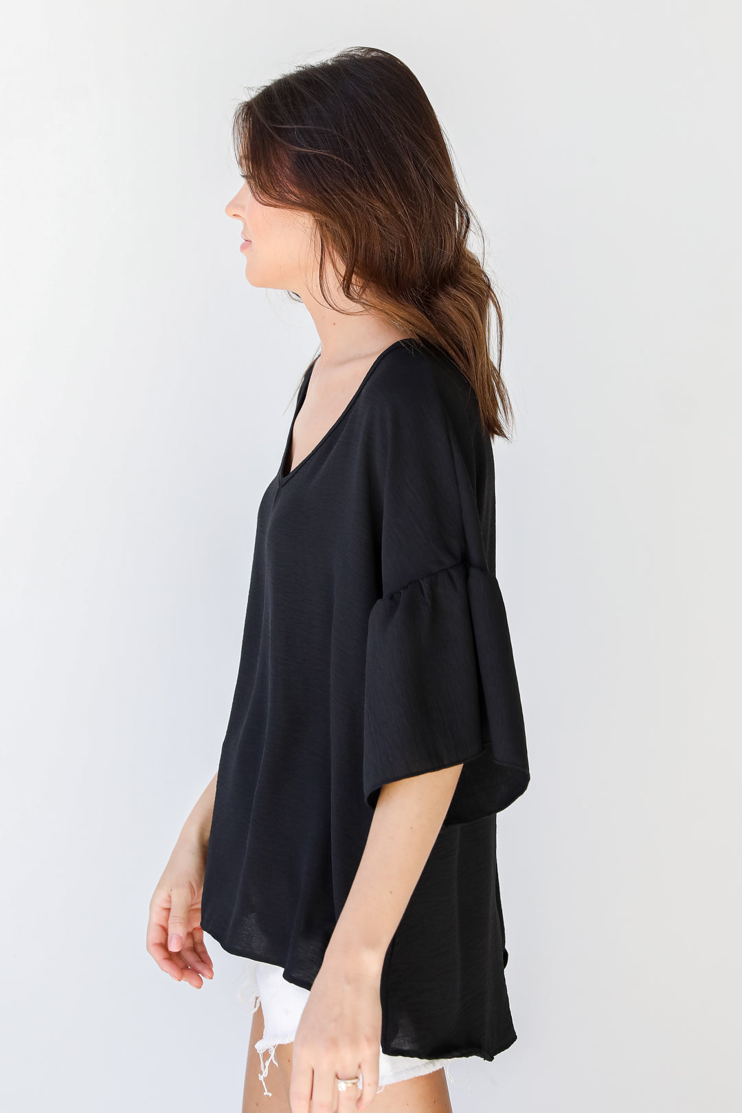 Ruffle Sleeve Blouse in black side view