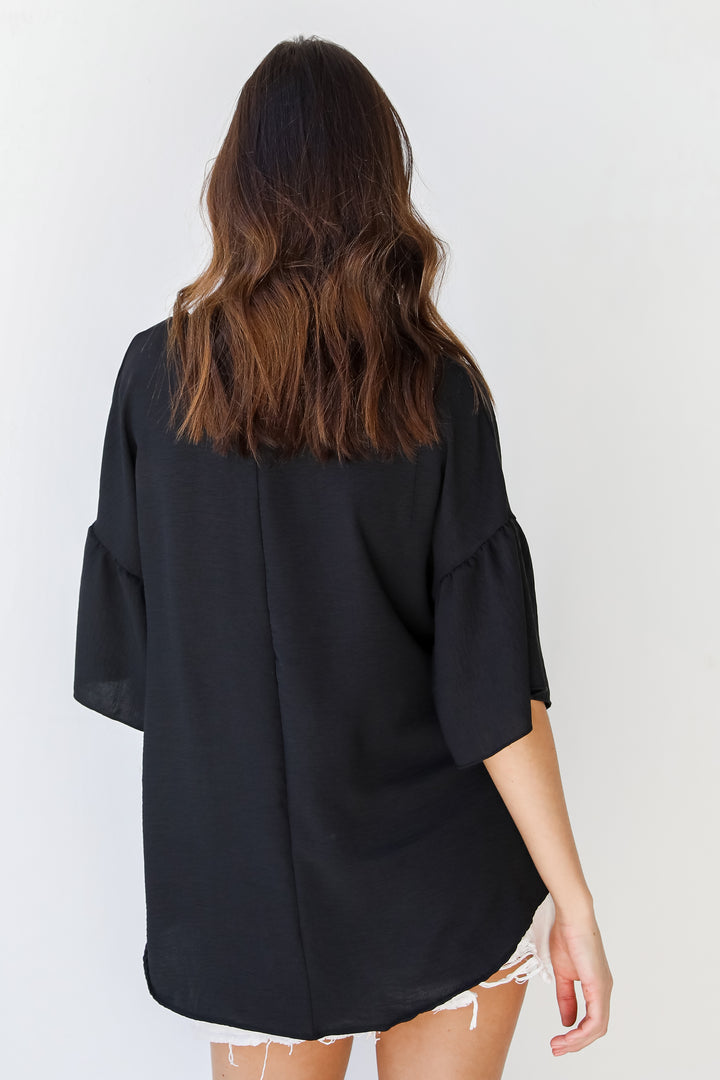 Ruffle Sleeve Blouse in black back view