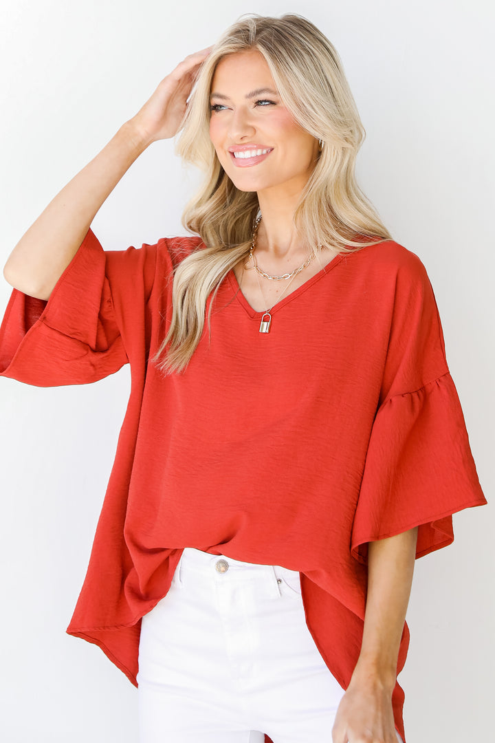 Ruffle Sleeve Blouse in brick front view