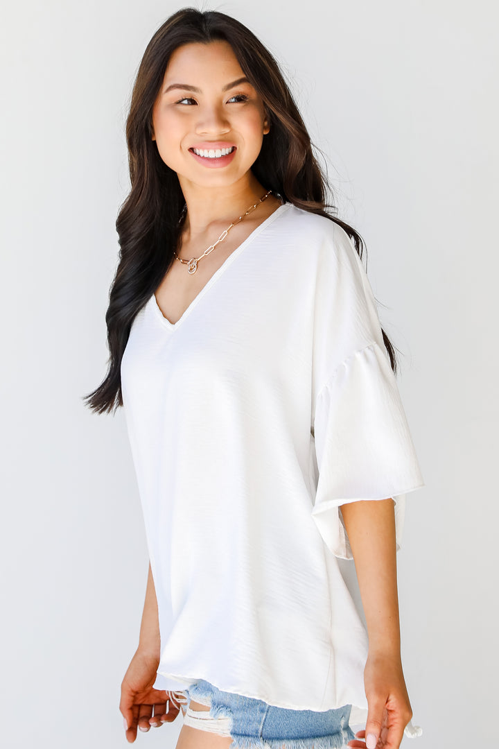 Ruffle Sleeve Blouse in ivory side view