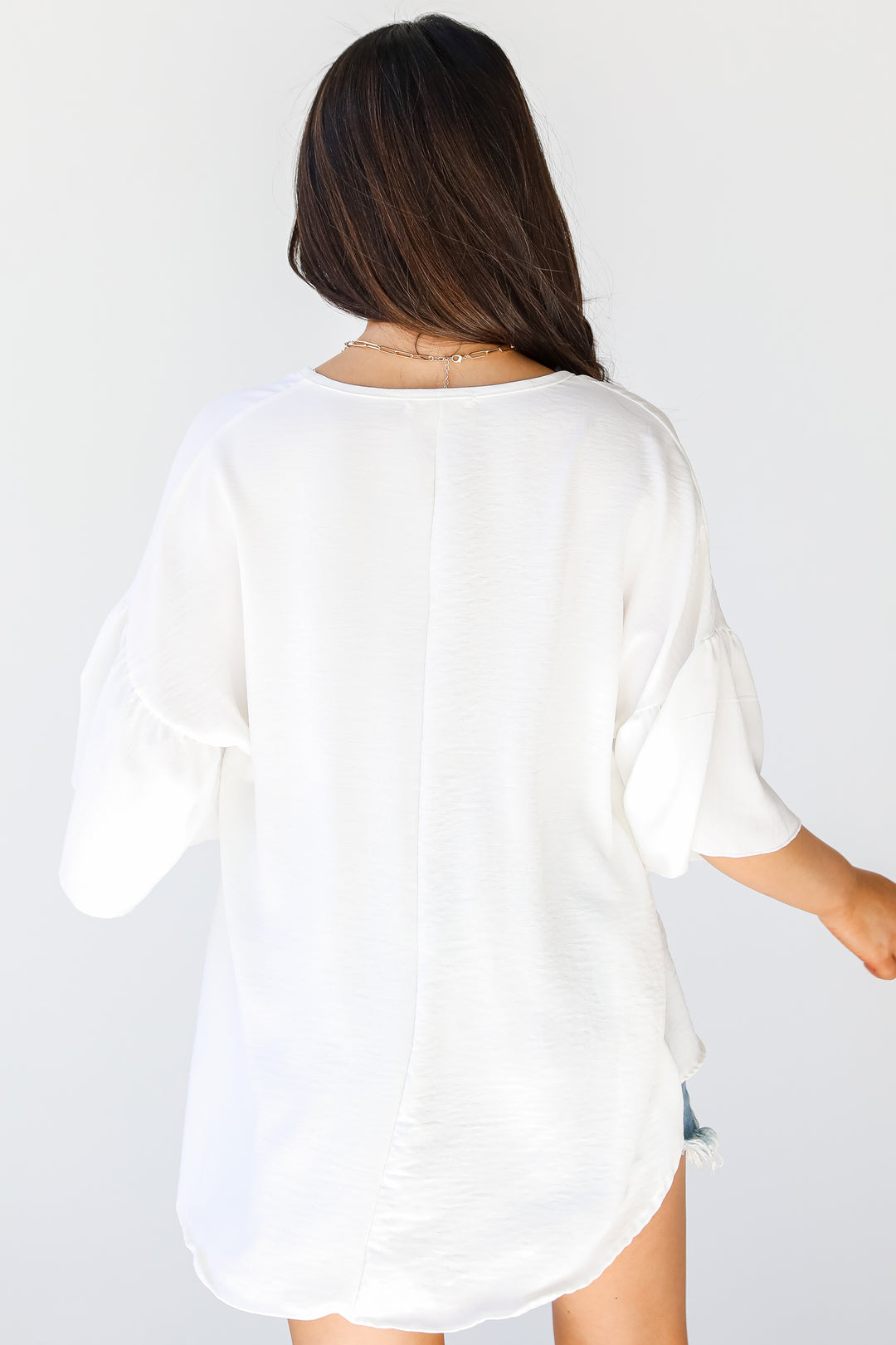 Ruffle Sleeve Blouse in ivory back view